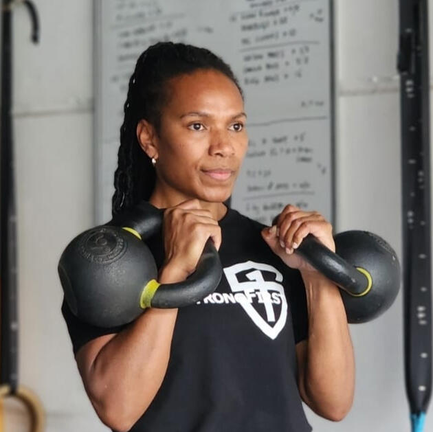 Tania Malie StrongFirst coach demonstrating kettlebell training